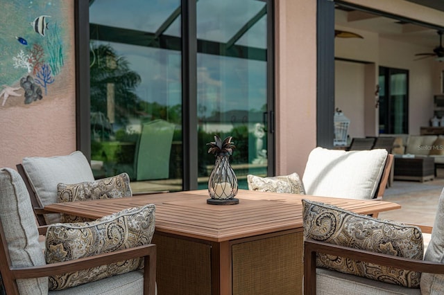 1131 Rotonda Cir, Rotonda West, FL 33947 - view of patio featuring an outdoor living space and a ceiling fan