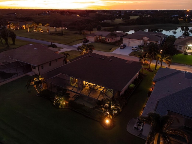 1131 Rotonda Cir, Rotonda West, FL 33947 - aerial view at dusk of a water view