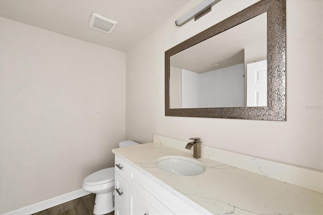234 Boundary Blvd Unit 3, Rotonda West, FL 33947 - bathroom with vanity and wood finished floors