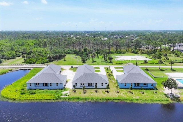 234 Boundary Blvd Unit 3, Rotonda West, FL 33947 - bird's eye view of a forest and a large body of water