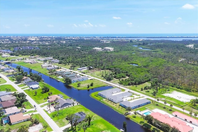 234 Boundary Blvd Unit 3, Rotonda West, FL 33947 - aerial perspective of suburban area with a nearby body of water