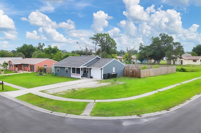 7590 Lyncrest St, North Port, FL 34287 - view of front of house featuring driveway, a residential view, and an attached garage
