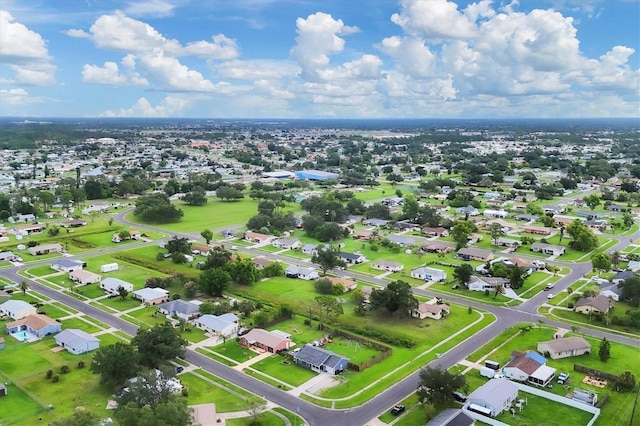 7590 Lyncrest St, North Port, FL 34287 - aerial perspective of suburban area