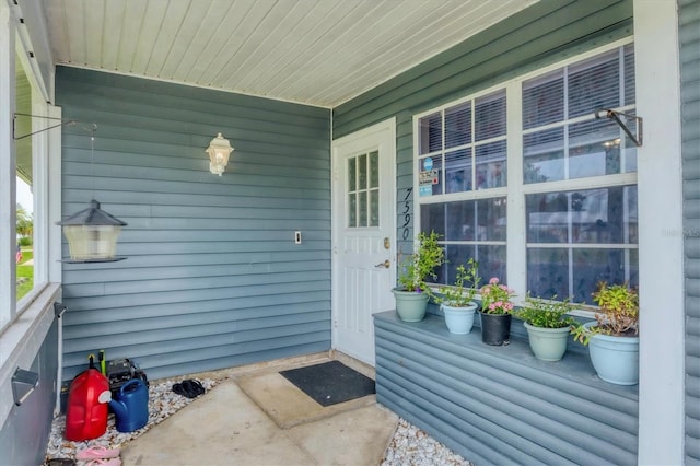7590 Lyncrest St, North Port, FL 34287 - entrance to property featuring covered porch