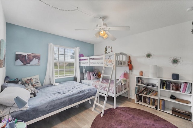 7590 Lyncrest St, North Port, FL 34287 - bedroom with wood finished floors and a ceiling fan