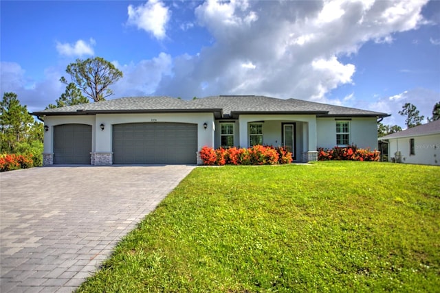 22156 Deborah Ave, Port Charlotte, FL 33954 - ranch-style house featuring decorative driveway, stucco siding, an attached garage, and a front yard