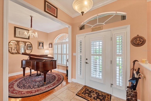 4 Pine Valley Pl, Rotonda West, FL 33947 - entryway featuring ornamental molding and a chandelier