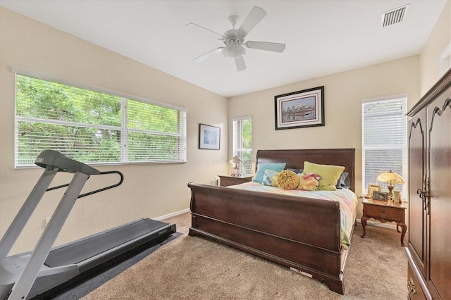 4 Pine Valley Pl, Rotonda West, FL 33947 - bedroom with light carpet and ceiling fan