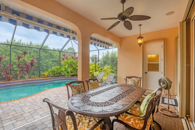 4 Pine Valley Pl, Rotonda West, FL 33947 - view of patio / terrace featuring outdoor dining space, a ceiling fan, an outdoor pool, and a lanai