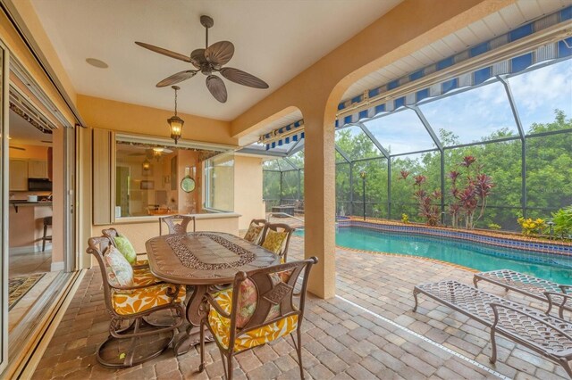 4 Pine Valley Pl, Rotonda West, FL 33947 - outdoor pool with a patio, ceiling fan, and a lanai
