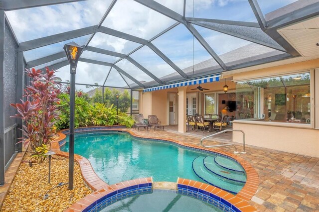 4 Pine Valley Pl, Rotonda West, FL 33947 - view of swimming pool with a patio area, a pool with connected hot tub, and a lanai