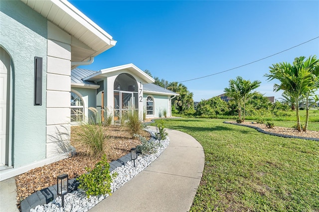 172 Mariner Ln, Rotonda West, FL 33947 - view of grassy yard