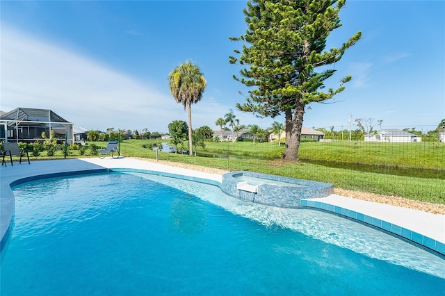 172 Mariner Ln, Rotonda West, FL 33947 - view of swimming pool with a pool with connected hot tub and a yard