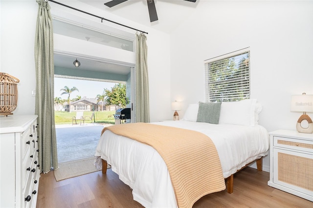 172 Mariner Ln, Rotonda West, FL 33947 - bedroom featuring access to outside, wood finished floors, and ceiling fan