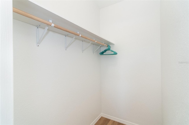 172 Mariner Ln, Rotonda West, FL 33947 - walk in closet with light wood-type flooring