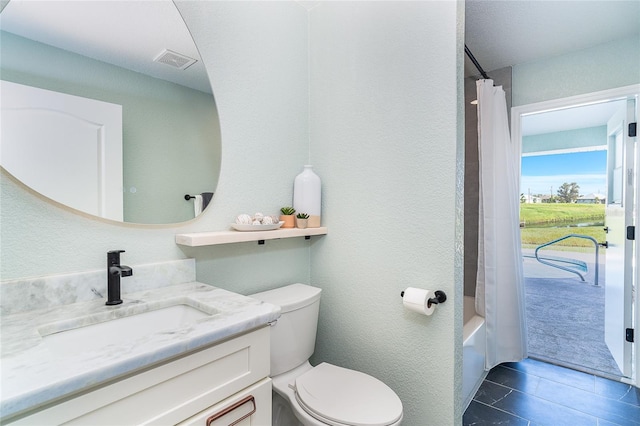 172 Mariner Ln, Rotonda West, FL 33947 - bathroom with vanity, shower / bathtub combination with curtain, and tile patterned floors
