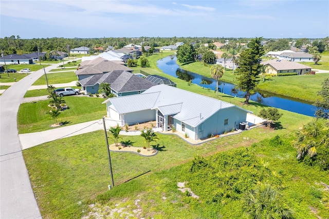 172 Mariner Ln, Rotonda West, FL 33947 - aerial perspective of suburban area with a nearby body of water