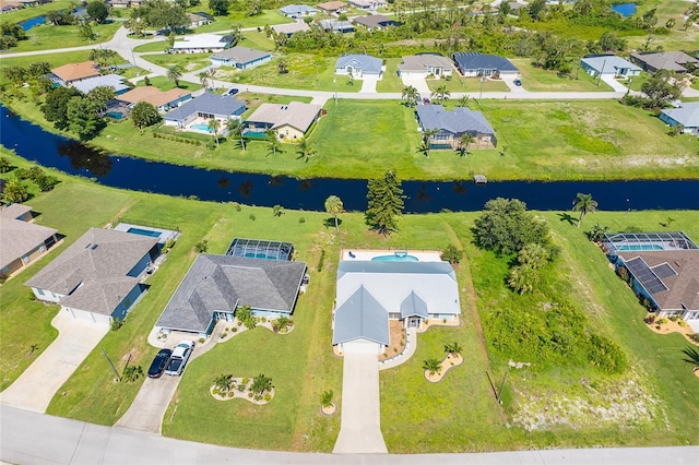172 Mariner Ln, Rotonda West, FL 33947 - aerial view of residential area with a nearby body of water