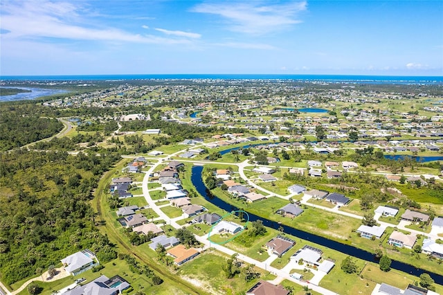 172 Mariner Ln, Rotonda West, FL 33947 - aerial view of property's location with a nearby body of water and nearby suburban area