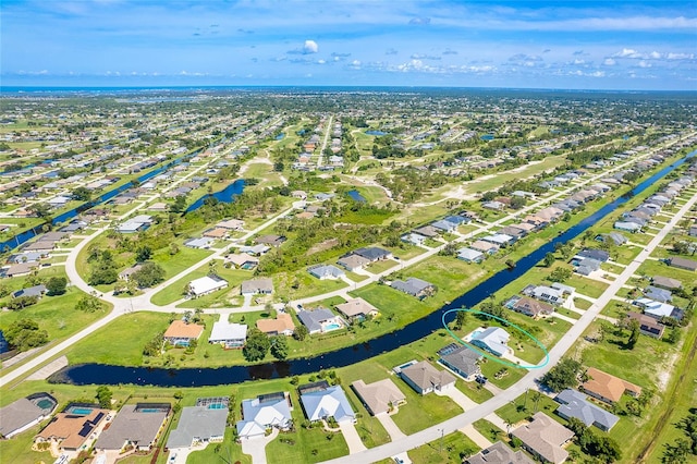 172 Mariner Ln, Rotonda West, FL 33947 - aerial perspective of suburban area featuring a large body of water