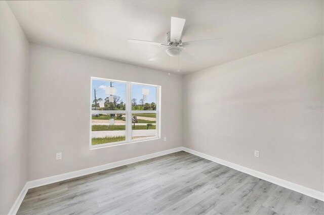 236 Boundary Blvd, Rotonda West, FL 33947 - unfurnished room with light wood-style flooring and ceiling fan