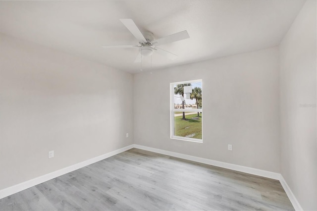 236 Boundary Blvd, Rotonda West, FL 33947 - unfurnished room with light wood finished floors and a ceiling fan