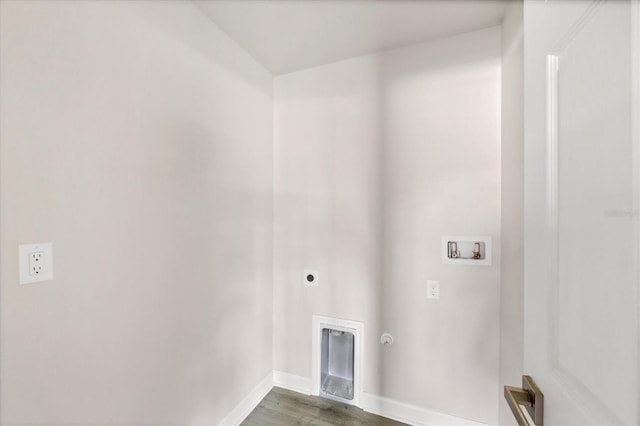 236 Boundary Blvd, Rotonda West, FL 33947 - laundry room featuring washer hookup, electric dryer hookup, dark wood finished floors, and gas dryer hookup
