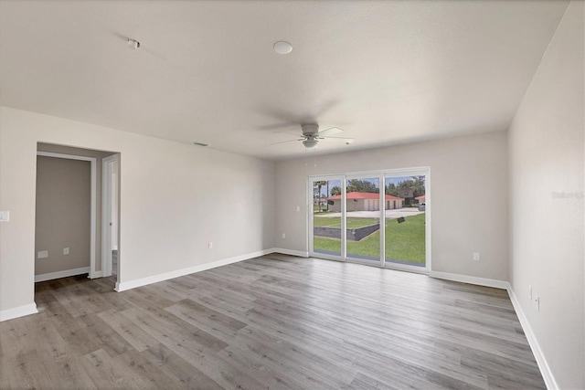 236 Boundary Blvd, Rotonda West, FL 33947 - unfurnished room with a ceiling fan and wood finished floors