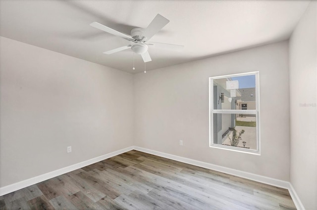 236 Boundary Blvd, Rotonda West, FL 33947 - empty room featuring wood finished floors and ceiling fan