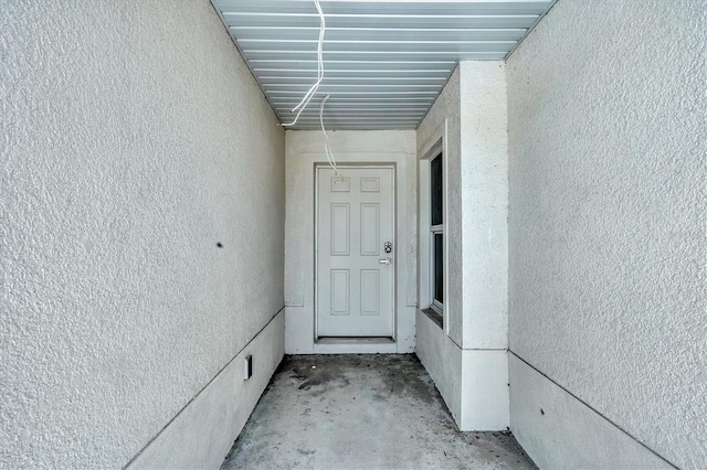 236 Boundary Blvd, Rotonda West, FL 33947 - property entrance featuring stucco siding