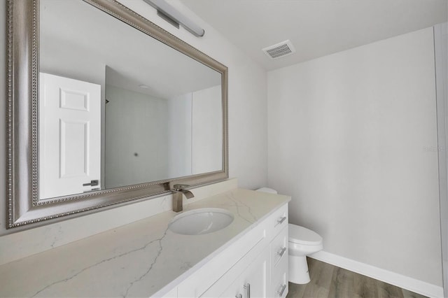 236 Boundary Blvd, Rotonda West, FL 33947 - bathroom featuring vanity and wood finished floors
