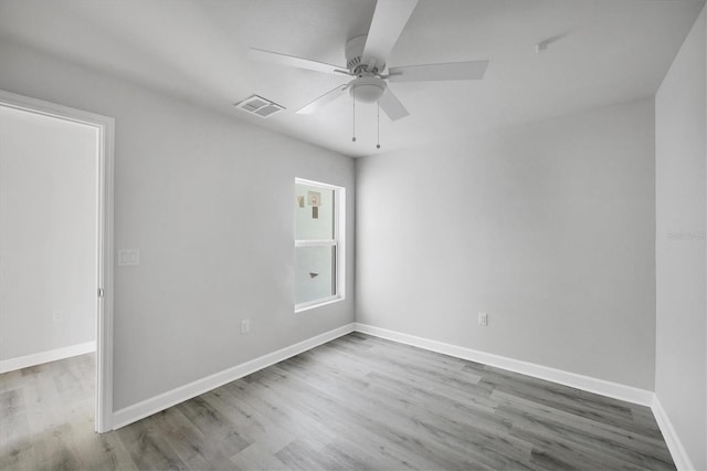 236 Boundary Blvd, Rotonda West, FL 33947 - empty room with wood finished floors and ceiling fan