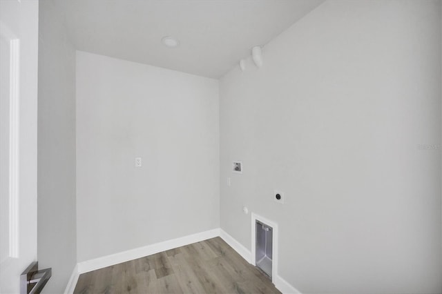 236 Boundary Blvd, Rotonda West, FL 33947 - washroom with electric dryer hookup, wood finished floors, and washer hookup