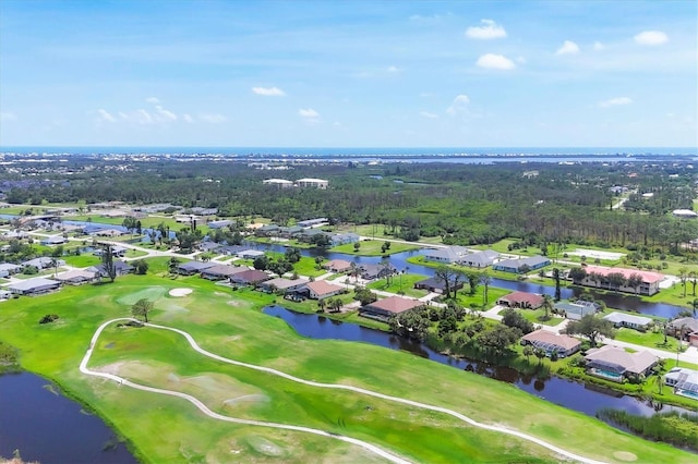 236 Boundary Blvd, Rotonda West, FL 33947 - aerial view of residential area with a golf course and a nearby body of water