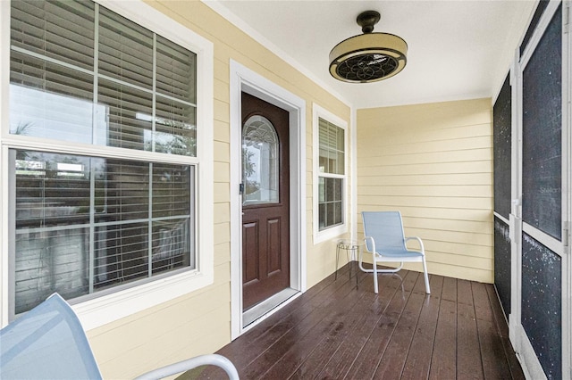 9150 Pine Cove Dr, Englewood, FL 34224 - property entrance with a porch