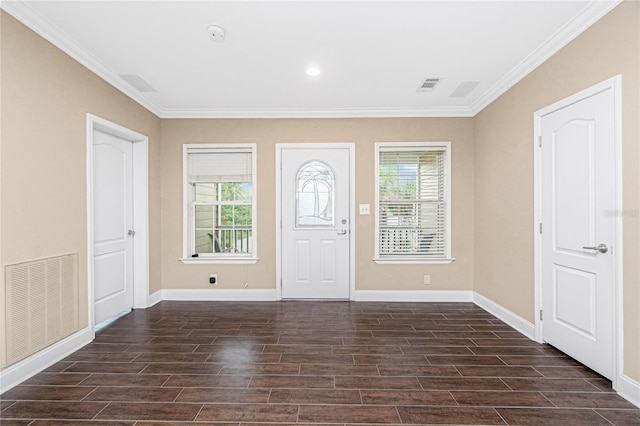 9150 Pine Cove Dr, Englewood, FL 34224 - entrance foyer with dark wood finished floors and crown molding