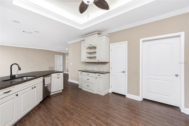 9150 Pine Cove Dr, Englewood, FL 34224 - kitchen featuring stainless steel dishwasher, a ceiling fan, ornamental molding, tasteful backsplash, and dark wood-type flooring
