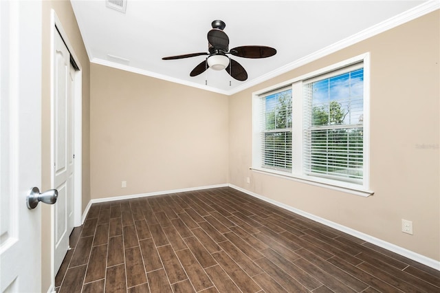 9150 Pine Cove Dr, Englewood, FL 34224 - empty room featuring ceiling fan, ornamental molding, and dark wood-style flooring