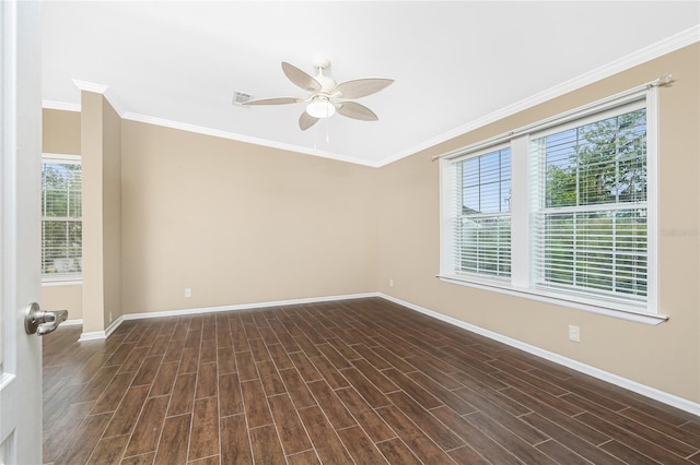 9150 Pine Cove Dr, Englewood, FL 34224 - spare room with a ceiling fan, plenty of natural light, dark wood-type flooring, and ornamental molding