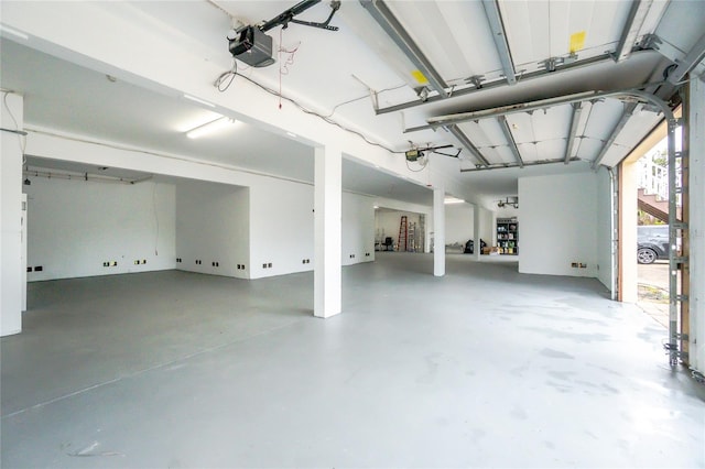 9150 Pine Cove Dr, Englewood, FL 34224 - garage with a garage door opener