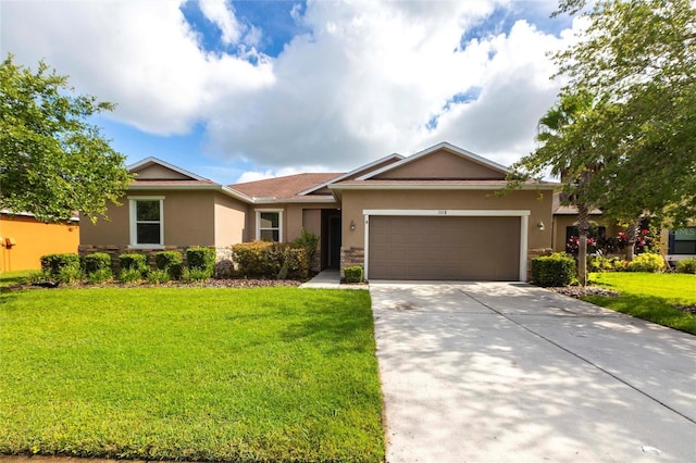 7318 61st St E, Palmetto, FL 34221 - ranch-style house with stucco siding, a garage, a front lawn, stone siding, and driveway