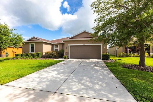 7318 61st St E, Palmetto, FL 34221 - single story home featuring stucco siding, a garage, concrete driveway, and a front yard