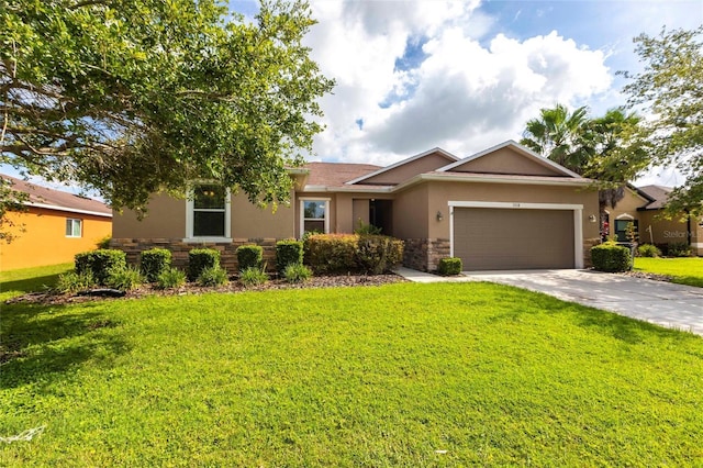 7318 61st St E, Palmetto, FL 34221 - ranch-style home with stone siding, stucco siding, a front yard, an attached garage, and concrete driveway