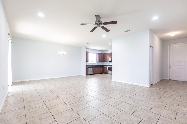 7318 61st St E, Palmetto, FL 34221 - unfurnished living room featuring a ceiling fan, a chandelier, light tile patterned floors, and recessed lighting