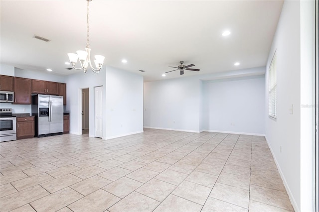 7318 61st St E, Palmetto, FL 34221 - kitchen featuring stainless steel appliances, recessed lighting, a ceiling fan, open floor plan, and light tile patterned flooring
