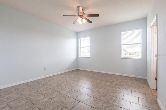7318 61st St E, Palmetto, FL 34221 - unfurnished room featuring ceiling fan and light tile patterned floors