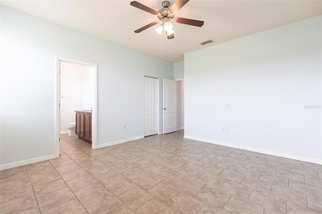 7318 61st St E, Palmetto, FL 34221 - empty room with ceiling fan and baseboards