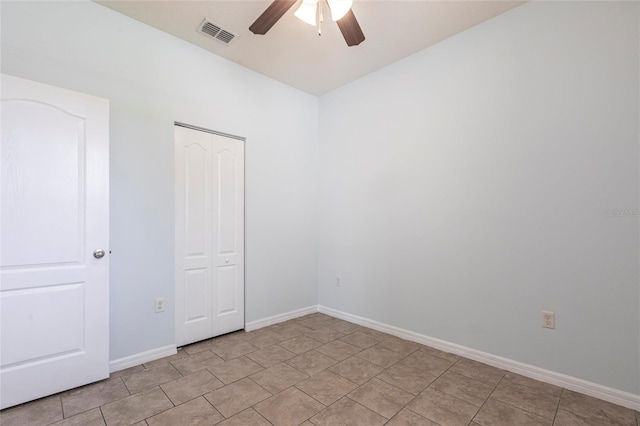 7318 61st St E, Palmetto, FL 34221 - spare room featuring a ceiling fan and baseboards