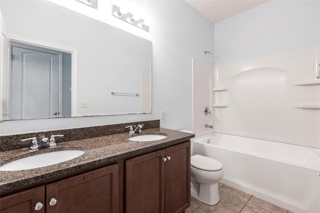 7318 61st St E, Palmetto, FL 34221 - full bath with double vanity, tile patterned floors, and  shower combination