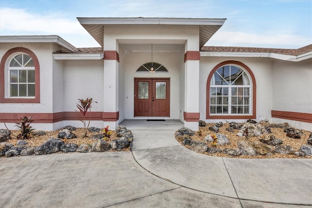 102 Marker Rd, Rotonda West, FL 33947 - entrance to property with stucco siding
